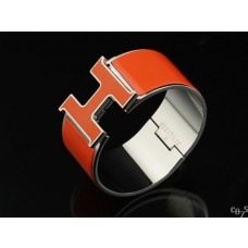 Replica Hermes Orange Enamel Clic H Bracelet Narrow Width (33mm) In Silver QY00420